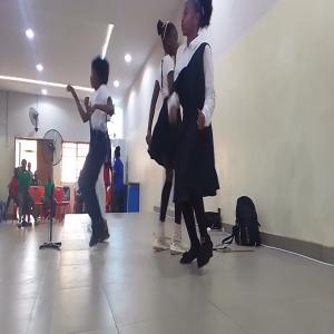 dance on stage (in on Old-school dress)