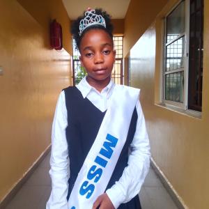 Damifunre as Miss SAAC (in the Winner)